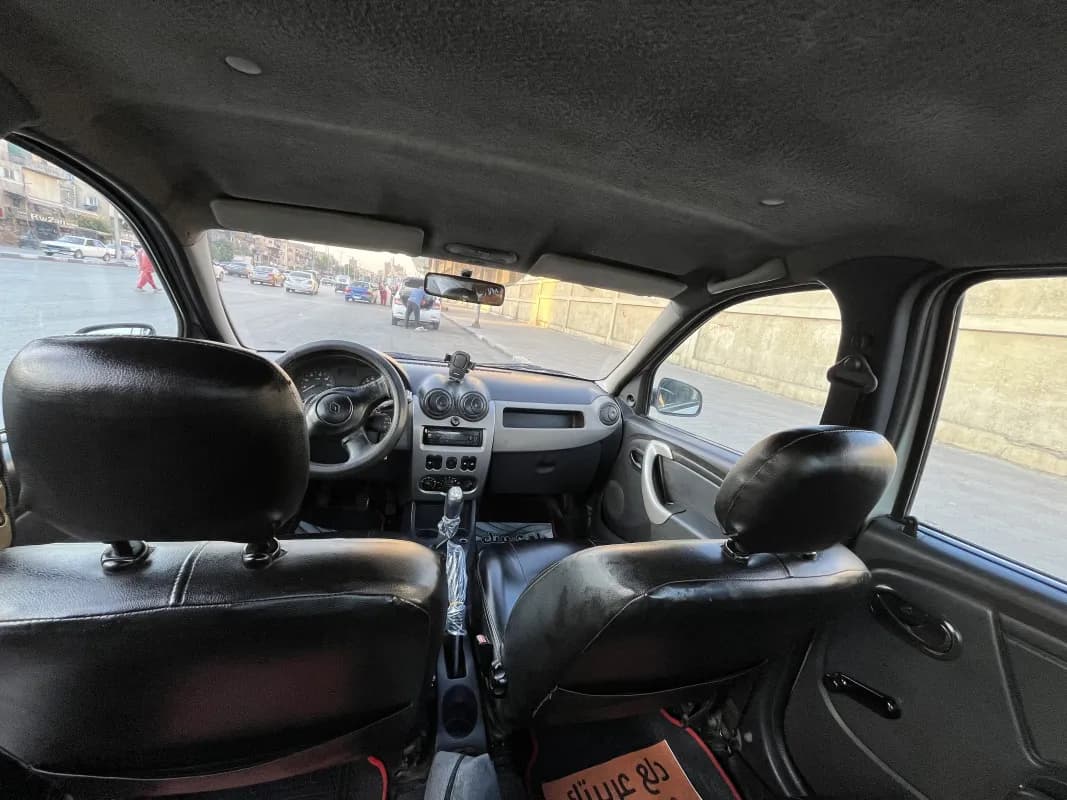 رينو لوجن 2013