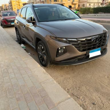 هيونداي توسان NX4e 2022 بلاك ديموند برونزي أوتوماتيك — مستعملة - 2