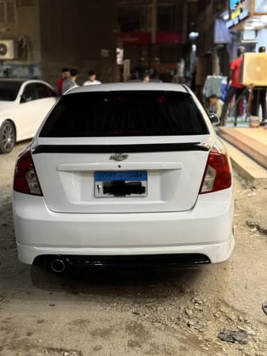 Chevrolet Optra 2014 LT White Automatic — Used - 4