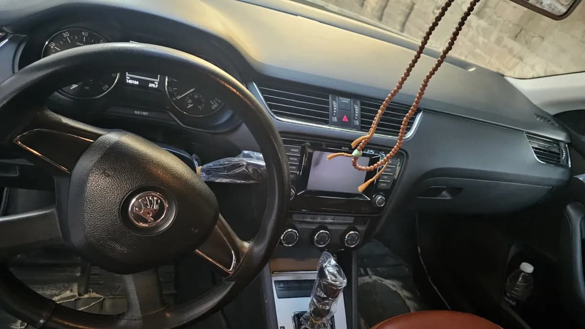  سكودا  اوكتفيا A7 2014 لوفت أسود أوتوماتيك — مستعملة