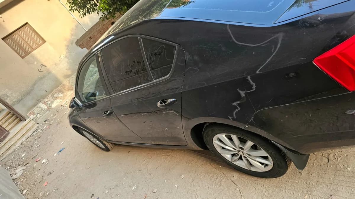  سكودا  اوكتفيا A7 2014 لوفت أسود أوتوماتيك — مستعملة