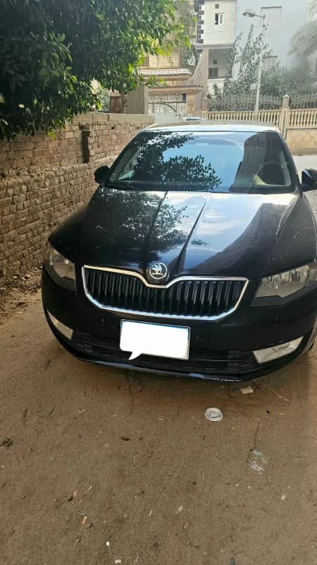  سكودا  اوكتفيا A7 2014 لوفت أسود أوتوماتيك — مستعملة