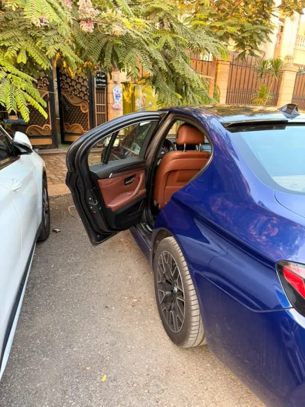 بي ام دبليو 520i 2014 ام سبورت أحمر أوتوماتيك — مستعملة