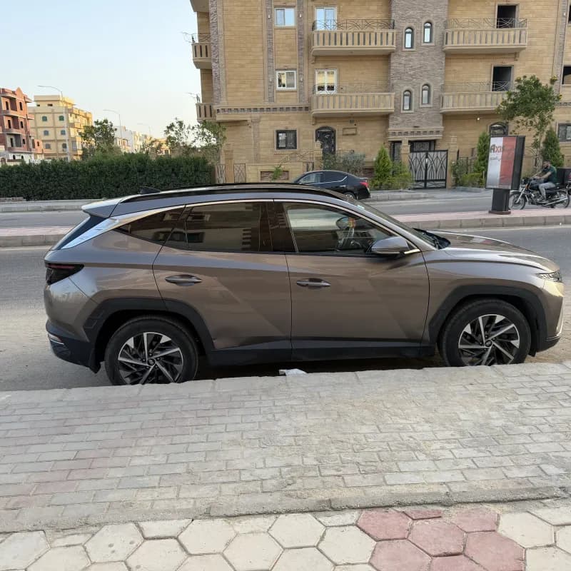هيونداي توسان NX4e 2022 بلاك ديموند برونزي أوتوماتيك — مستعملة