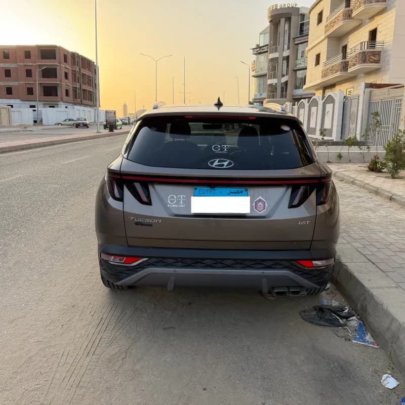 هيونداي توسان NX4e 2022 بلاك ديموند برونزي أوتوماتيك — مستعملة
