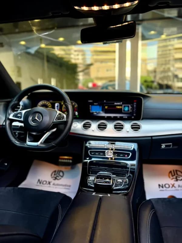 مرسيدس بنز E200 2018 ايه ام جي أبيض أوتوماتيك — مستعملة