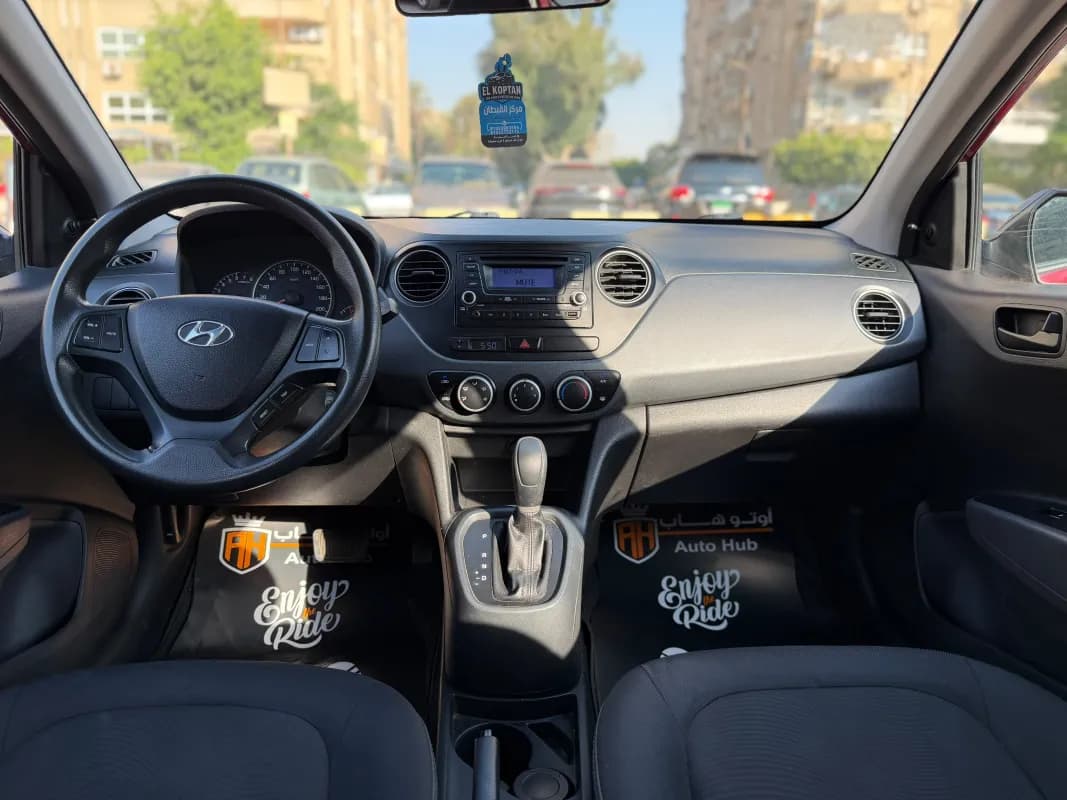 هيونداي جراند I10 2015 جي ال أحمر غامق أوتوماتيك — مستعملة