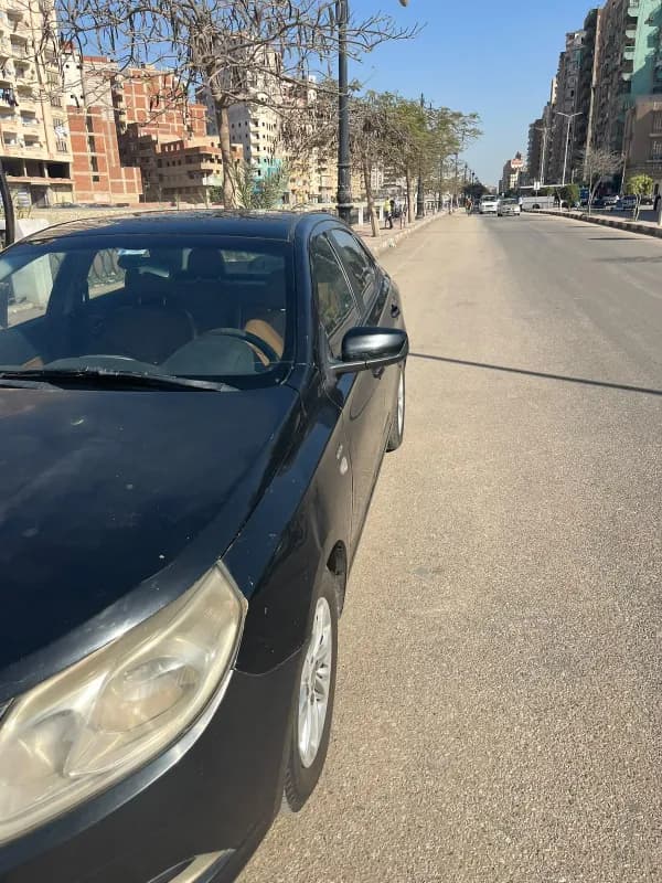 شيفروليه أوبترا 2015 ال تي أسود أوتوماتيك — مستعملة