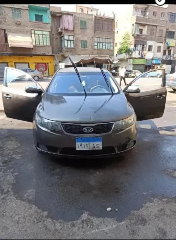 Kia Cerato 2011 LX FO Brown Automatic — Used