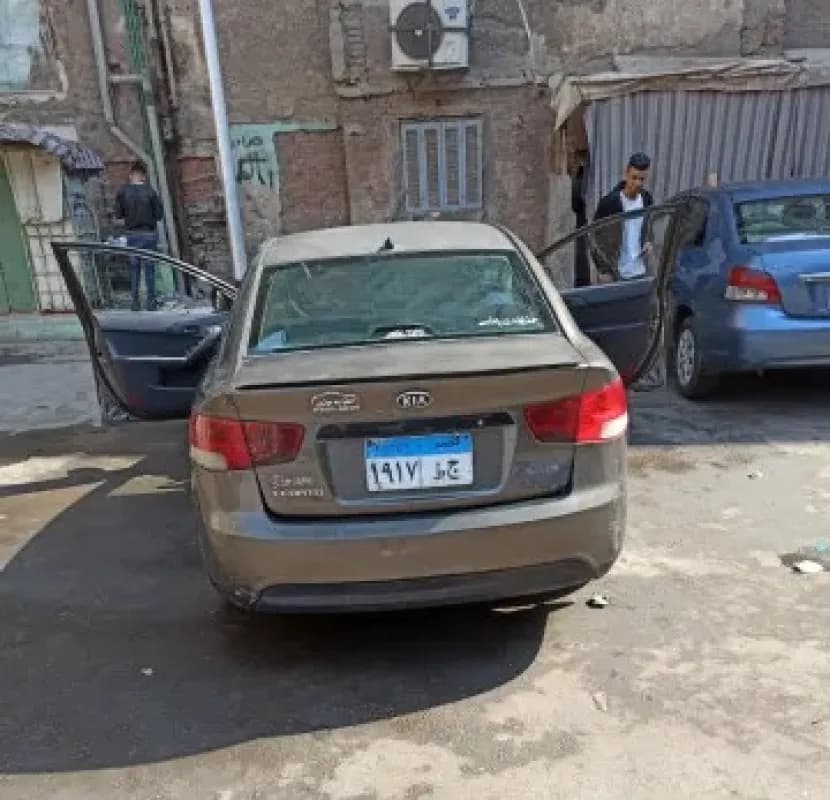 Kia Cerato 2011 LX FO Brown Automatic — Used