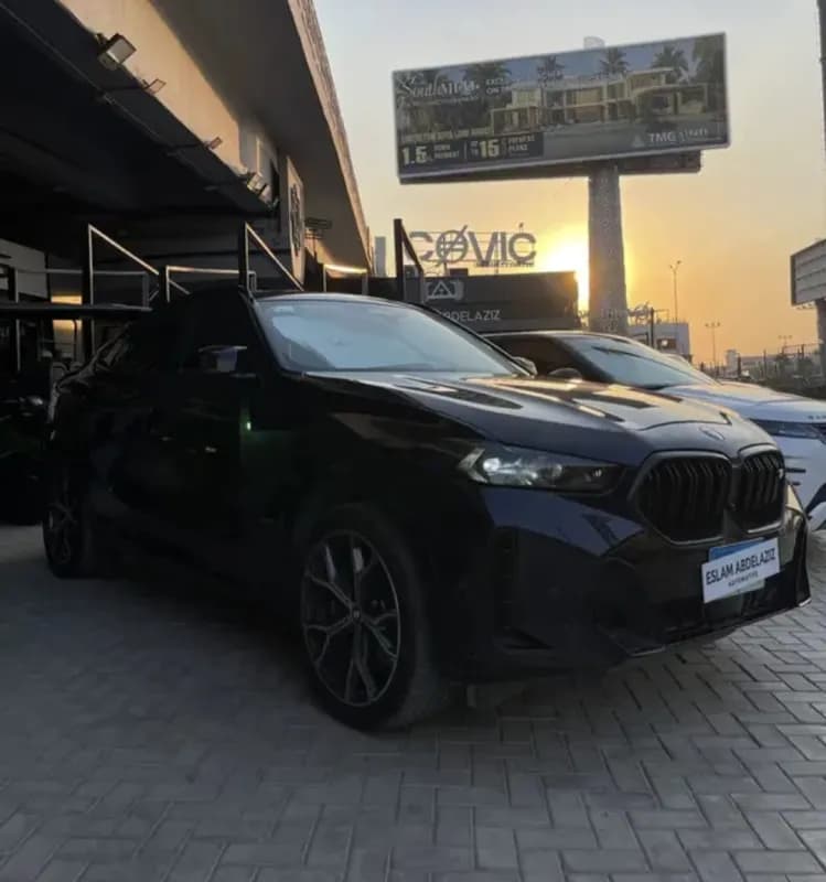 بي ام دبليو X6 2024 ام 60 اي اكس درايف أزرق الداكن أوتوماتيك — مستعملة