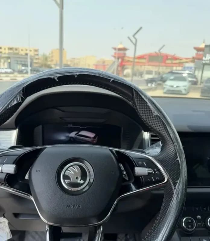 سكودا كودياك 2021 امبشن أبيض أوتوماتيك — مستعملة