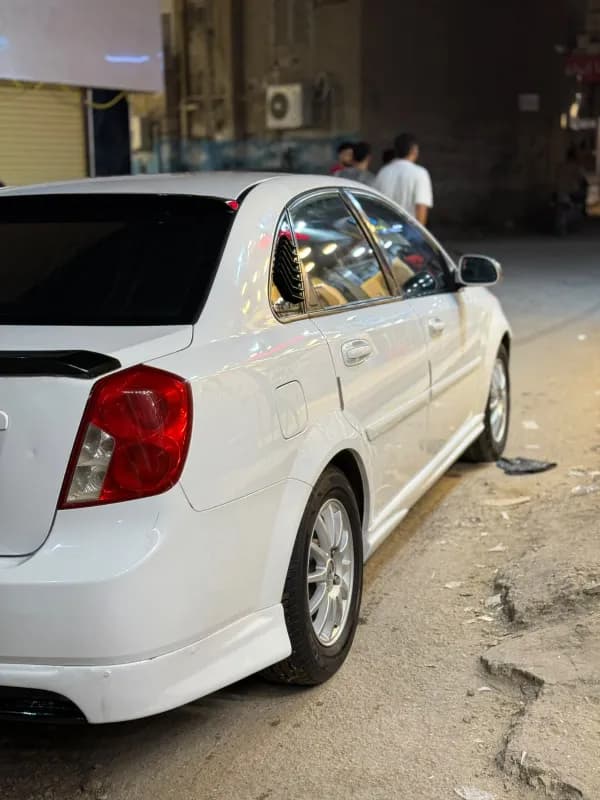 Chevrolet Optra 2014 LT White Automatic — Used
