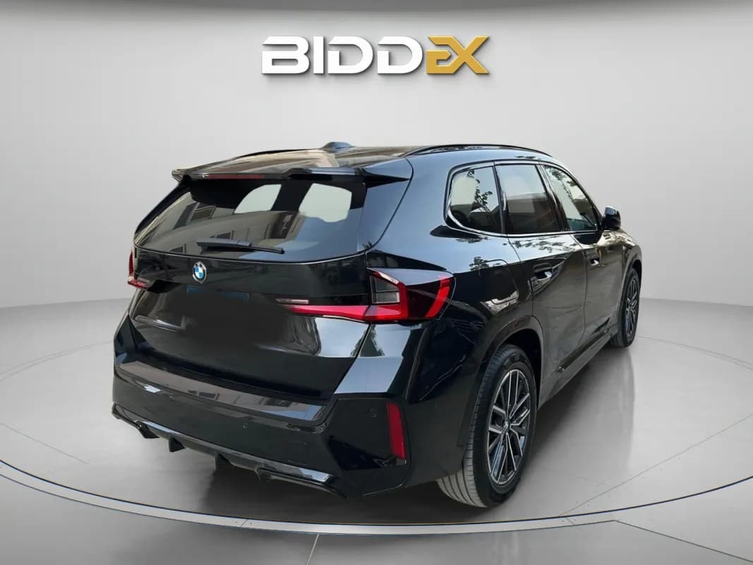 بي ام دبليو X1 2024 اي درايف أسود أوتوماتيك — مستعملة