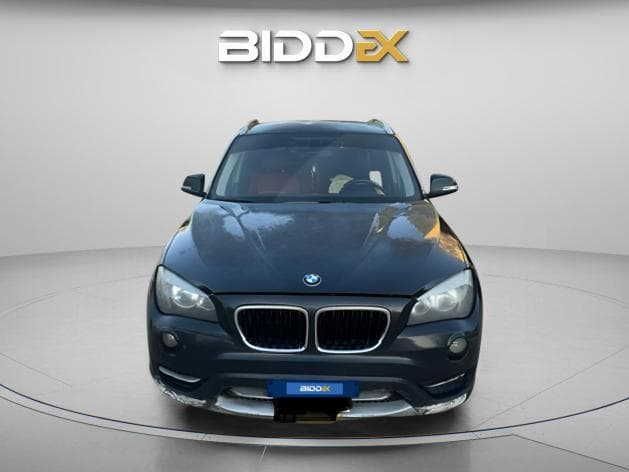 بي ام دبليو X1 2013 اي درايف أسود أوتوماتيك — مستعملة - 1