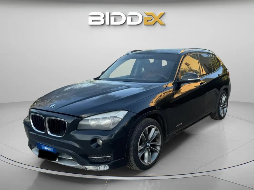 بي ام دبليو X1 2013 اي درايف أسود أوتوماتيك — مستعملة