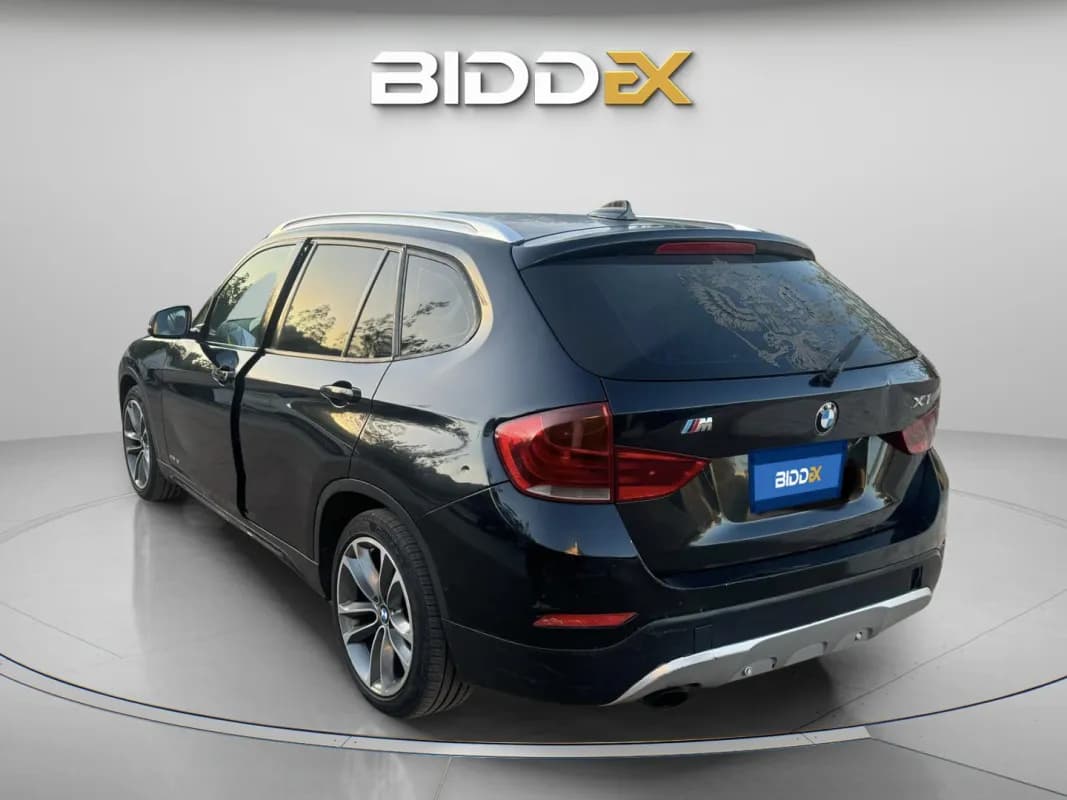 بي ام دبليو X1 2013 اي درايف أسود أوتوماتيك — مستعملة
