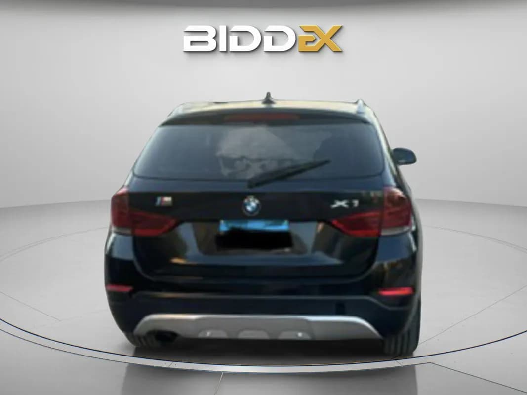 بي ام دبليو X1 2013 اي درايف أسود أوتوماتيك — مستعملة