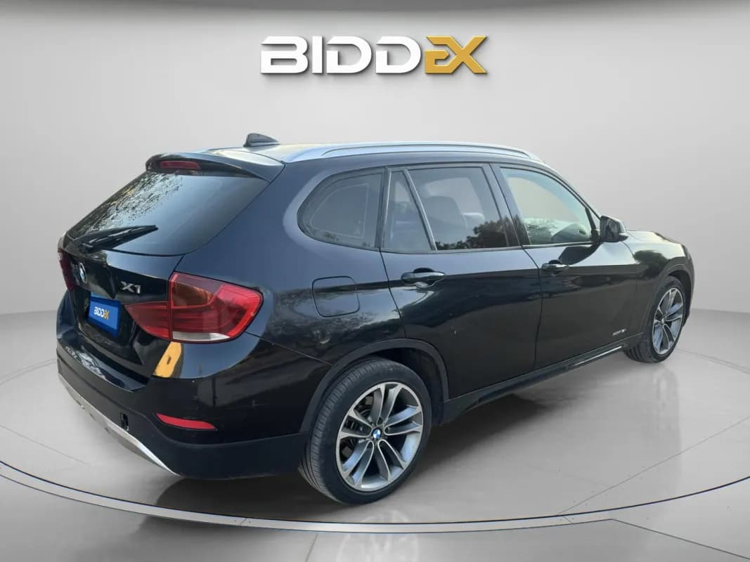 بي ام دبليو X1 2013 اي درايف أسود أوتوماتيك — مستعملة