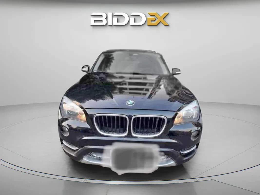 بي ام دبليو X1 2013 اي درايف أسود أوتوماتيك — مستعملة